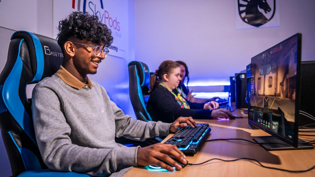 A student sat at a computer