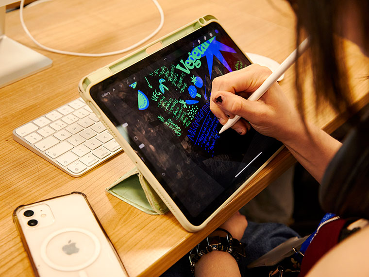 Someone drawing on a graphics tablet