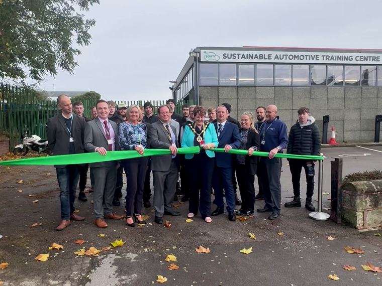 Ribbon cutting at the opening of the Sustainable Automotive Training Centre