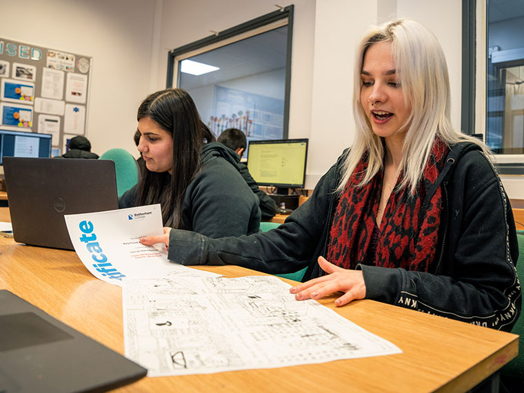 Two students sat at a table