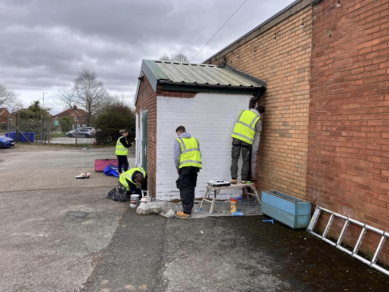 painting the outside of the building