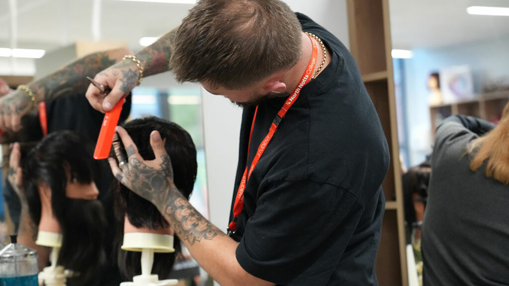 Someone cutting short hair