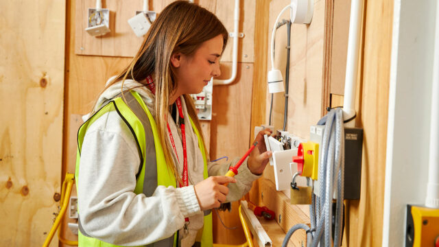 A student working in the electrical installations class