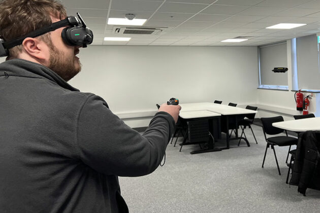 Students having a go on the drone