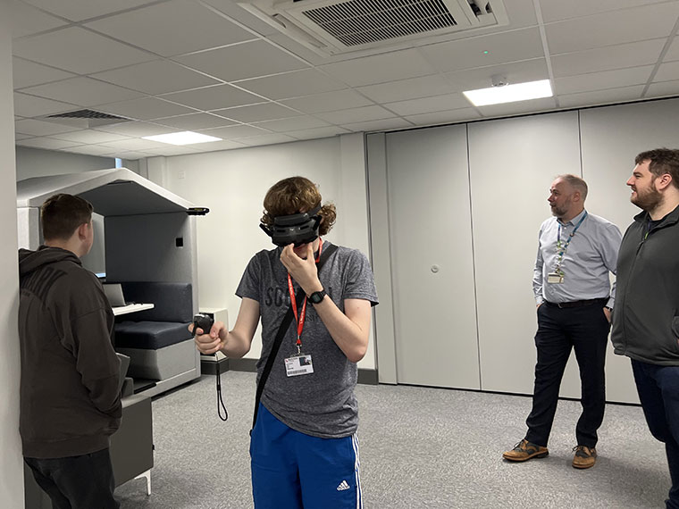 Students having a go on the drone