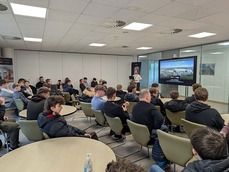 A group of students listening to a talk at Laing O’Rourke