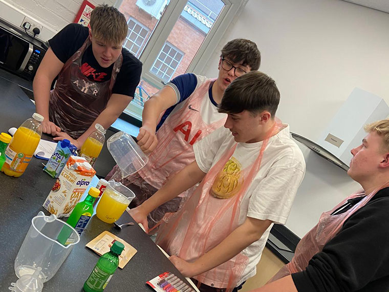 Students taking part in a hydration science experiment