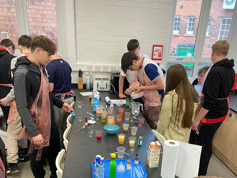 Students taking part in a hydration science experiment