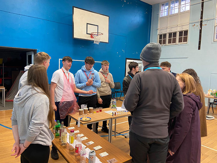 Students listening to a hydration science talk