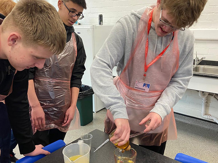 Students taking part in a hydration science experiment