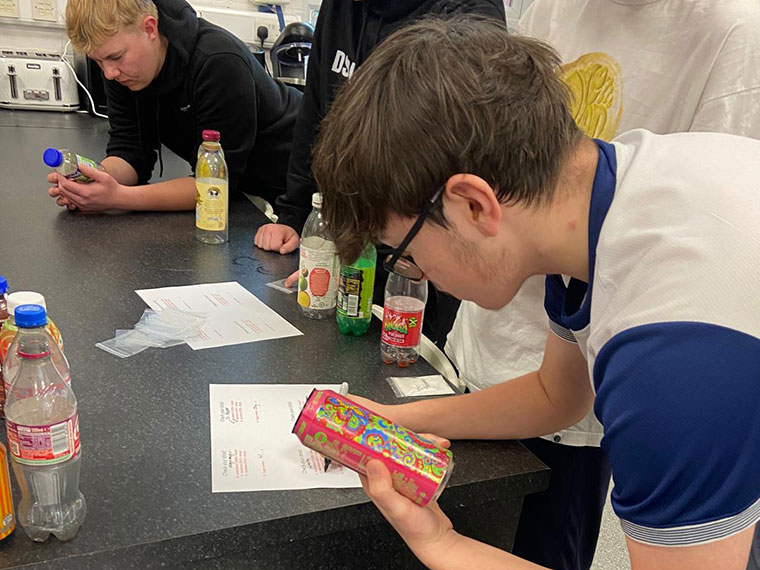 Students taking part in a hydration science experiment