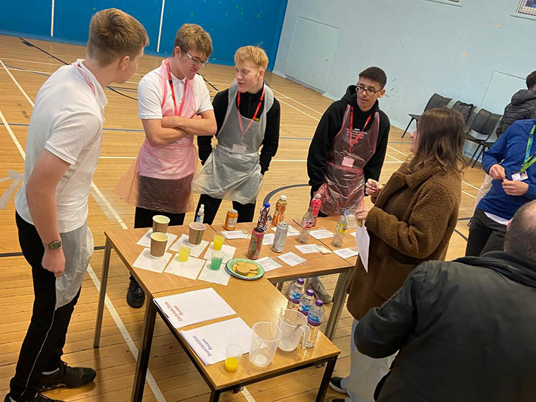 Students listening to a hydration science talk