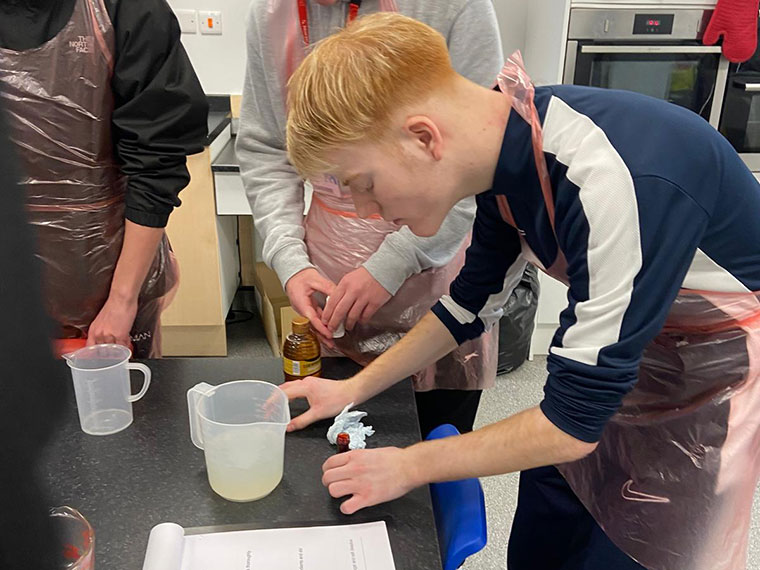 Students taking part in a hydration science experiment