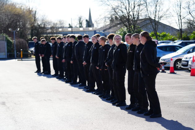Protective services students lining up for drill parade.