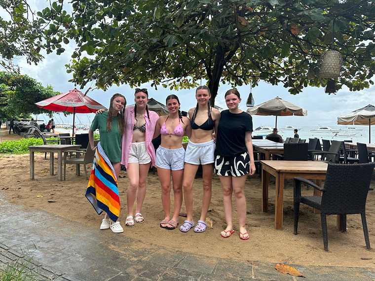 Five female students ready for the beach