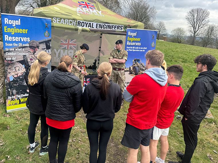 Students stood looking at a Royal Engineers stand