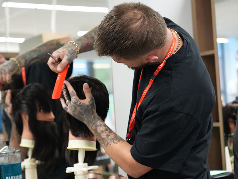 Someone cutting short hair