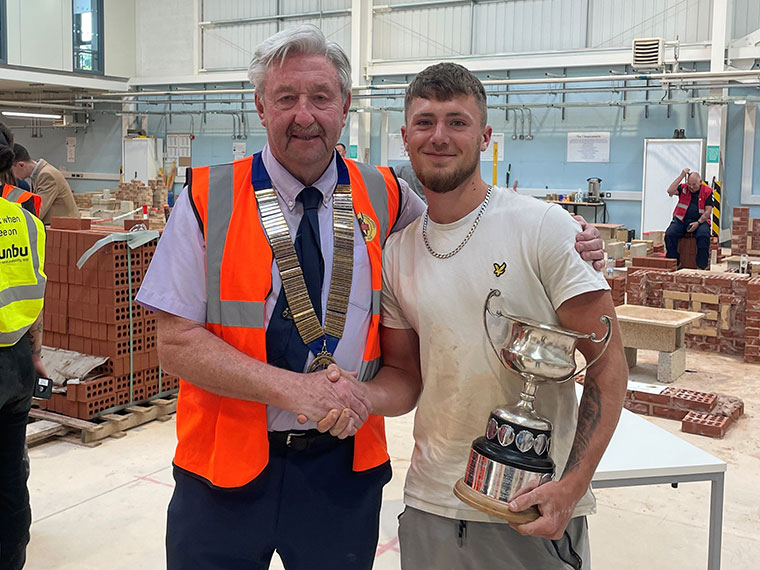 Corey Richardson winning the senior title at the Guild of Bricklayers competition 2025