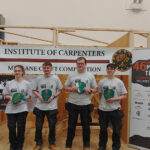 Four students being awarded for the Merlane Trophy 2025