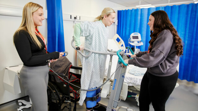 Three health students in the health suite
