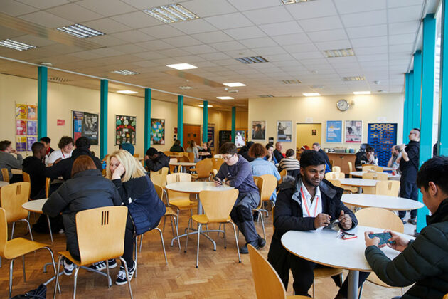 People sat at tables in the bistro at North Notts College