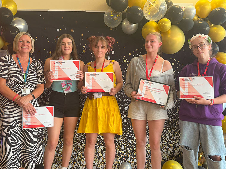 Students receiving awards at the end of year student celebration event 2024