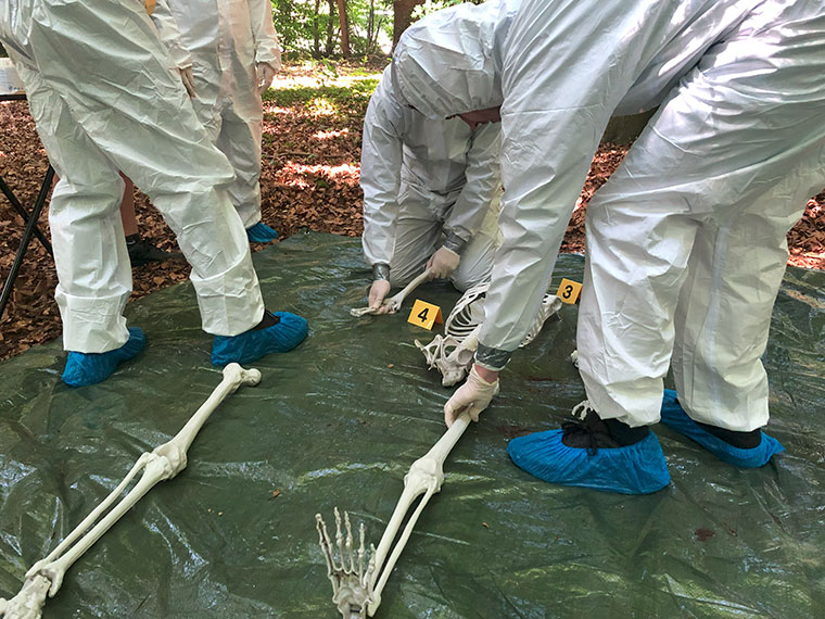 Protective Services students in a mock CSI investigation at Hannah Park