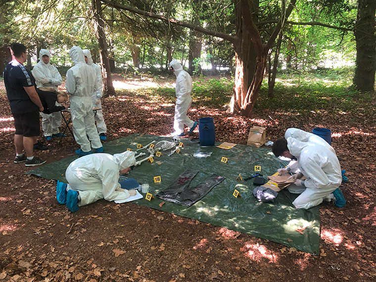 Protective Services students in a mock CSI investigation at Hannah Park