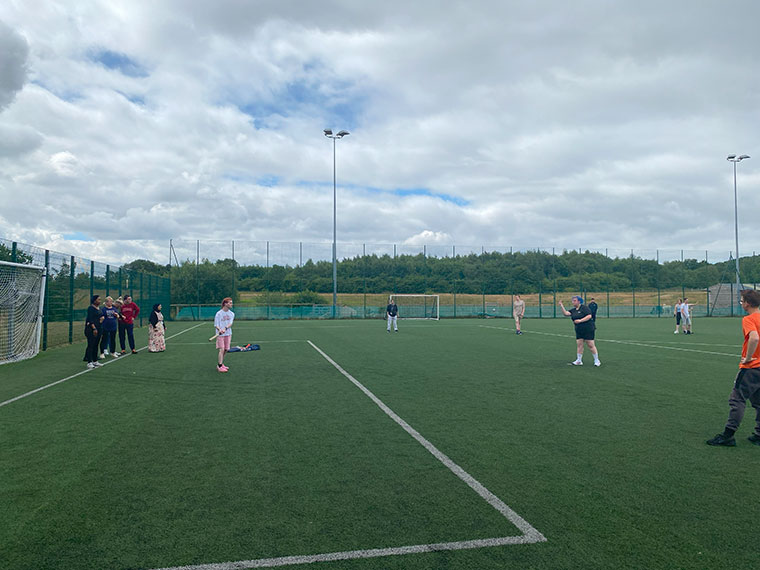 Flex students playing football at their sports day
