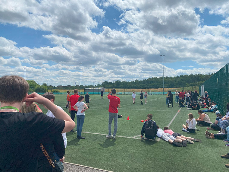 Flex students playing football at their sports day