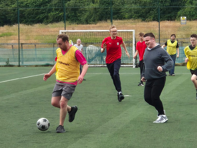 Flex students playing football at their sports day