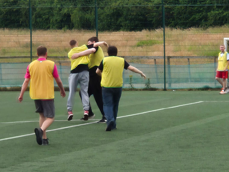 Flex students playing football at their sports day