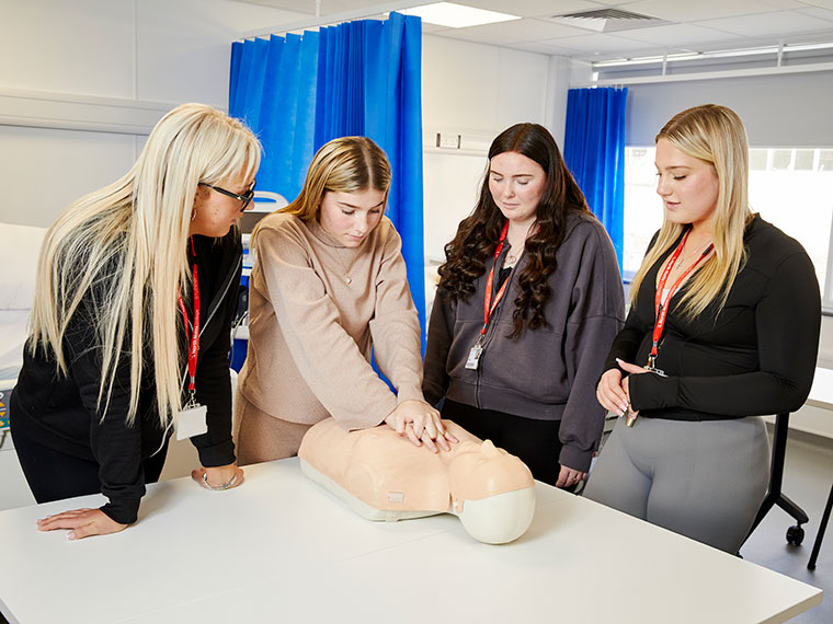 Students in the North Notts College health suite learning CPR
