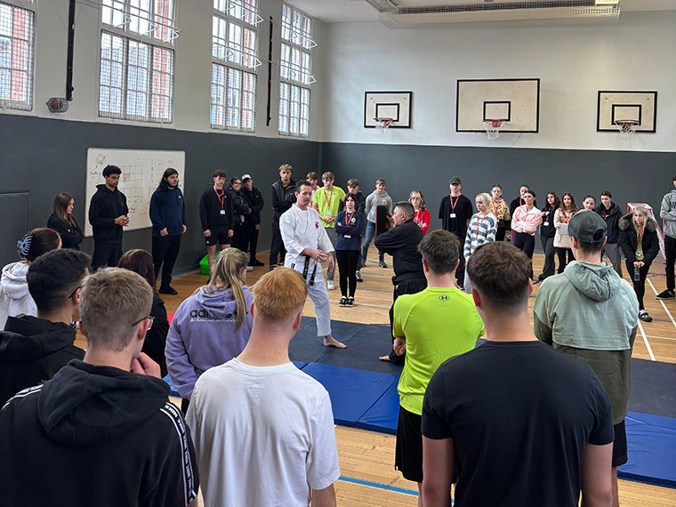 Practicing karate in the sports hall