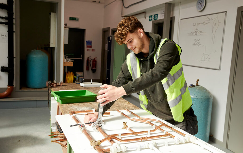 A pluming student at North Notts College