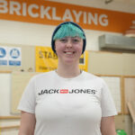 Adult bricklaying student Leah in the workshop