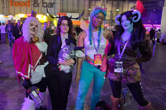 Four students posing for a photo at the Esports DreamHack festival