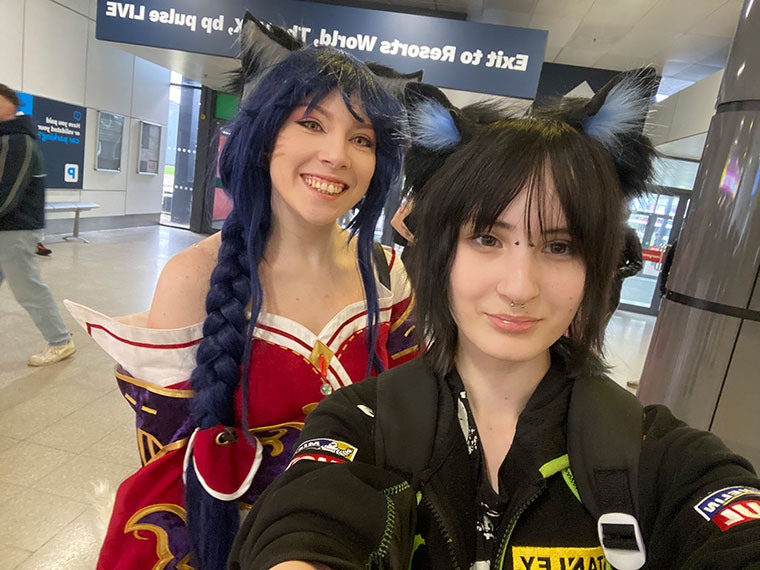 Two students taking a self of themselves